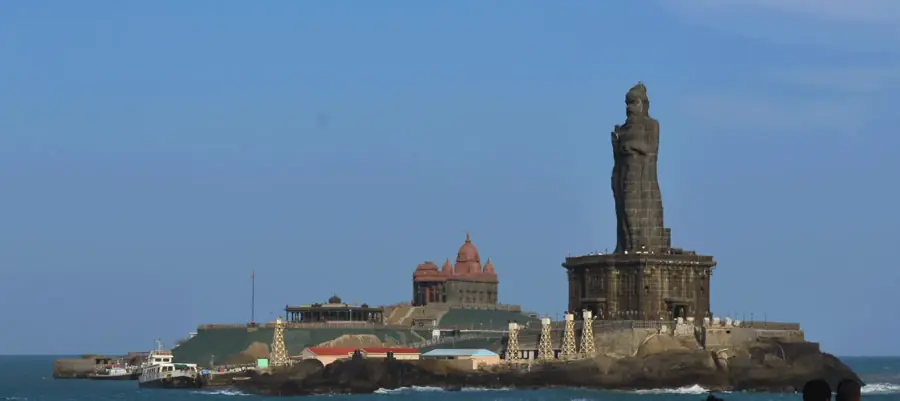 Vivekananda Rock Memorial and Thiruvalluvar Statue seen from the Kanyakumari shore at midday