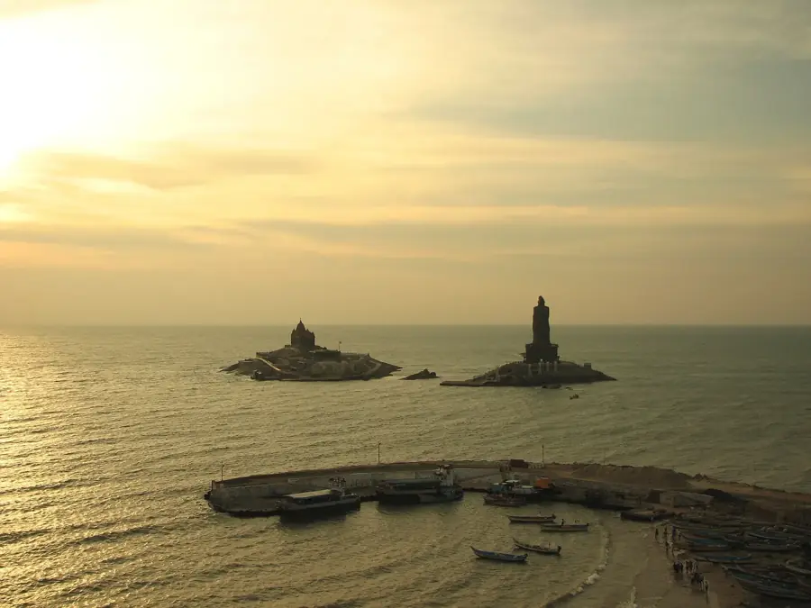 Sunrise over the sea at Kanyakumari with the Vivekananda Rock Memorial silhouetted offshore